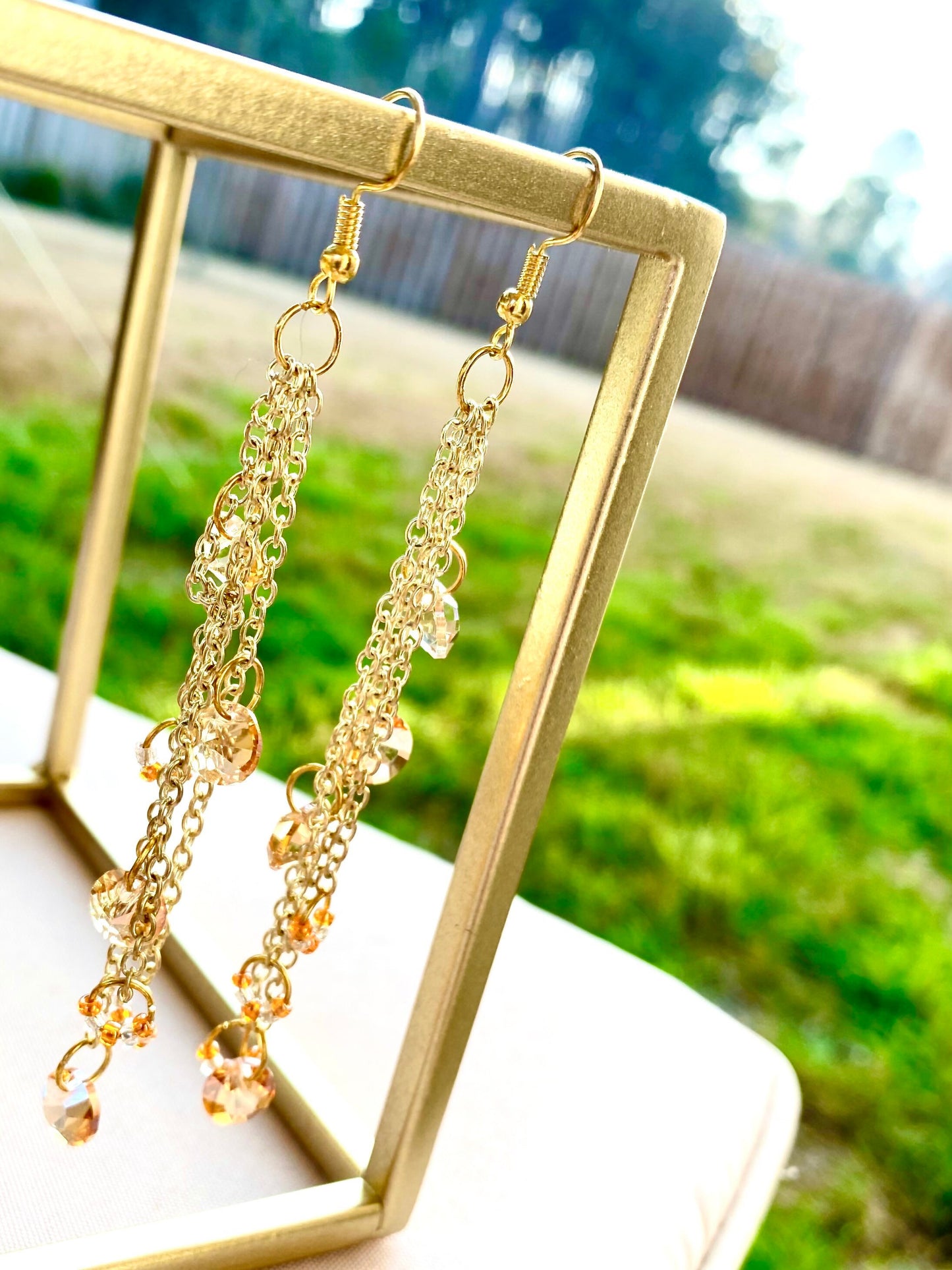 Peach diamond dangle chain earrings | handmade gold chain earrings | peachy orange colored iridescent dangling diamond | prom | pageant |